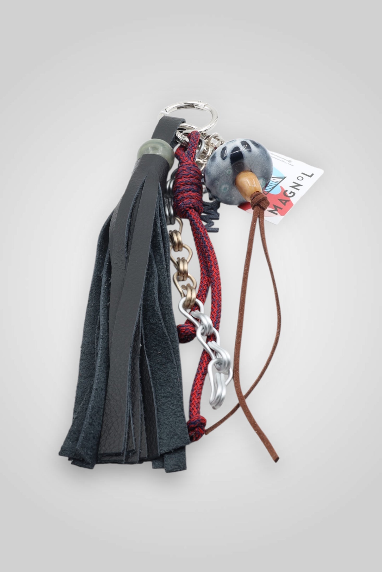LEATHER TASSEL BAG CHARM - GREEN